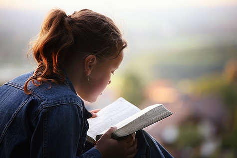 girl reading bible